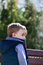 Cute boy outdoor at a spring time Royalty Free Stock Photo