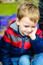 Cute boy outdoor at a spring time Royalty Free Stock Photo