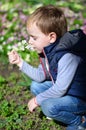 Cute boy outdoor at a spring time Royalty Free Stock Photo