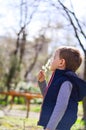 Cute boy outdoor at a spring time Royalty Free Stock Photo