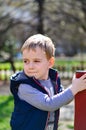 Cute boy outdoor at a spring time Royalty Free Stock Photo