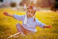 Cute boy, playing with airplane on sunset in the park Royalty Free Stock Photo