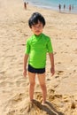 Cute boy playing on the beach Royalty Free Stock Photo