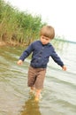 Cute boy playing on the beach Royalty Free Stock Photo