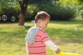Cute boy playing bubbles Royalty Free Stock Photo
