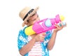 Cute boy playing water gun on white background Royalty Free Stock Photo