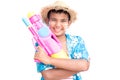Cute boy playing water gun on white background Royalty Free Stock Photo