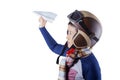 Cute boy plays a paper plane Royalty Free Stock Photo