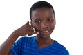 Cute boy pretending to talk on a cell phone Royalty Free Stock Photo