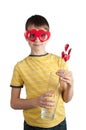 Cute boy in red glasses with hearts and vase