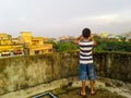 Cute boy on a roof Royalty Free Stock Photo