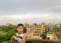 Cute boy on a roof Royalty Free Stock Photo