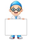 Cute boy in a school uniform holding blank sign Royalty Free Stock Photo