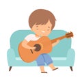 Cute Boy Sitting on Sofa and Playing Guitar, Kids Hobby or Creative Activity Cartoon Vector Illustration Royalty Free Stock Photo