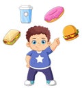 A cute boy standing and pointing many junk food Royalty Free Stock Photo