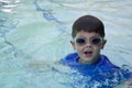 Cute boy with swimming goggles Royalty Free Stock Photo