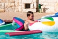 Cute boy swimming on rafts Royalty Free Stock Photo