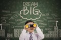 Cute boy with text of dream big Royalty Free Stock Photo