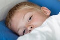 Cute boy waking up Royalty Free Stock Photo