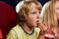 Cute Boy Watching Movie in Cinema Royalty Free Stock Photo