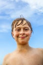 Cute boy with wet hair at the beach Royalty Free Stock Photo