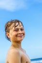 Cute boy with wet hair at the beach Royalty Free Stock Photo