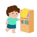 Cute boy wiping the dust from bookshelf .
