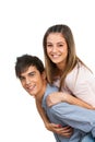 Cute boyfriend piggybacking his girlfriend. Royalty Free Stock Photo