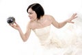 Cute bride holding a magic silver ball