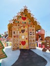 Cute brown bread house decorated with stars and hearts