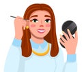 Cute brown-haired girl using eye shadows, brush holding pocket mirror in hand, beauty blogger