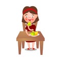 Cute brunette girl stay at kitchen table and eat fresh eco pears