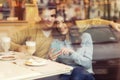 Cute brunette loving couple in cozy warm sweaters on a date at t Royalty Free Stock Photo