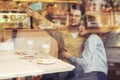 Cute brunette loving couple in cozy warm sweaters on a date at t Royalty Free Stock Photo