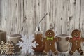 Cute bulb cup and cardboard cup, gingerbread cookies. Christmas ornaments. Wooden and sackcloth organic Christmas