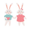 Cute bunnies in love. Bunny boy with heart holding bunny girl by the hand Royalty Free Stock Photo