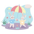 Cute bunnies under an umbrella. Autumn rabbits with falling leaves
