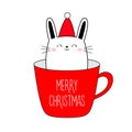Cute bunnny in cup of coffee tea. Red Santa hat. Merry Christmas Happy New Year. Funny kawaii doodle animal. Line rabbit hare. Royalty Free Stock Photo