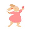 Cute bunny holding brush and painting egg for Easter. Funny baby rabbit standing in dress. Colored flat vector Royalty Free Stock Photo