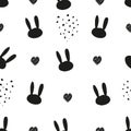 Cute bunny or rabbit and black and white easter pattern with doodle hearts and dots. Happy Easter background, advertisement, fabri