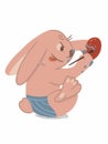 cute bunny sitting and diligently painting easter egg Royalty Free Stock Photo