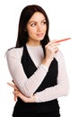 Cute businesswoman pointing with a marker Royalty Free Stock Photo