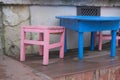 Cute cafe, small pink chairs and yellow table Royalty Free Stock Photo