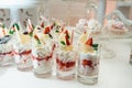 Cute candy bar with various candies and cakes. Wedding sweets