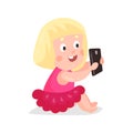 Cute cartoon blonde girl sitting on a floor and playing with smartphone colorful character Illustration Royalty Free Stock Photo