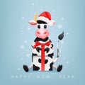 Cute cartoon bull, cow with gift and santa claus hat Royalty Free Stock Photo