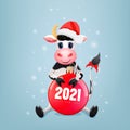 Cute cartoon bull, cow with red christmas ball and santa claus hat Royalty Free Stock Photo