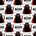 Cute cartoon cat wear vampire costume with fangs, horns and red cloak. Doodle cross elements and boo word. Halloween seamless Royalty Free Stock Photo