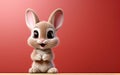 cute cartoon character hare rabbit bunny points paw at copy space on an orange isolated background