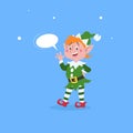 Cute cartoon elf with dummy speech bubble waving hand. Christmas funny character. Santa Claus helper. Elfish boy. Isolated on blue